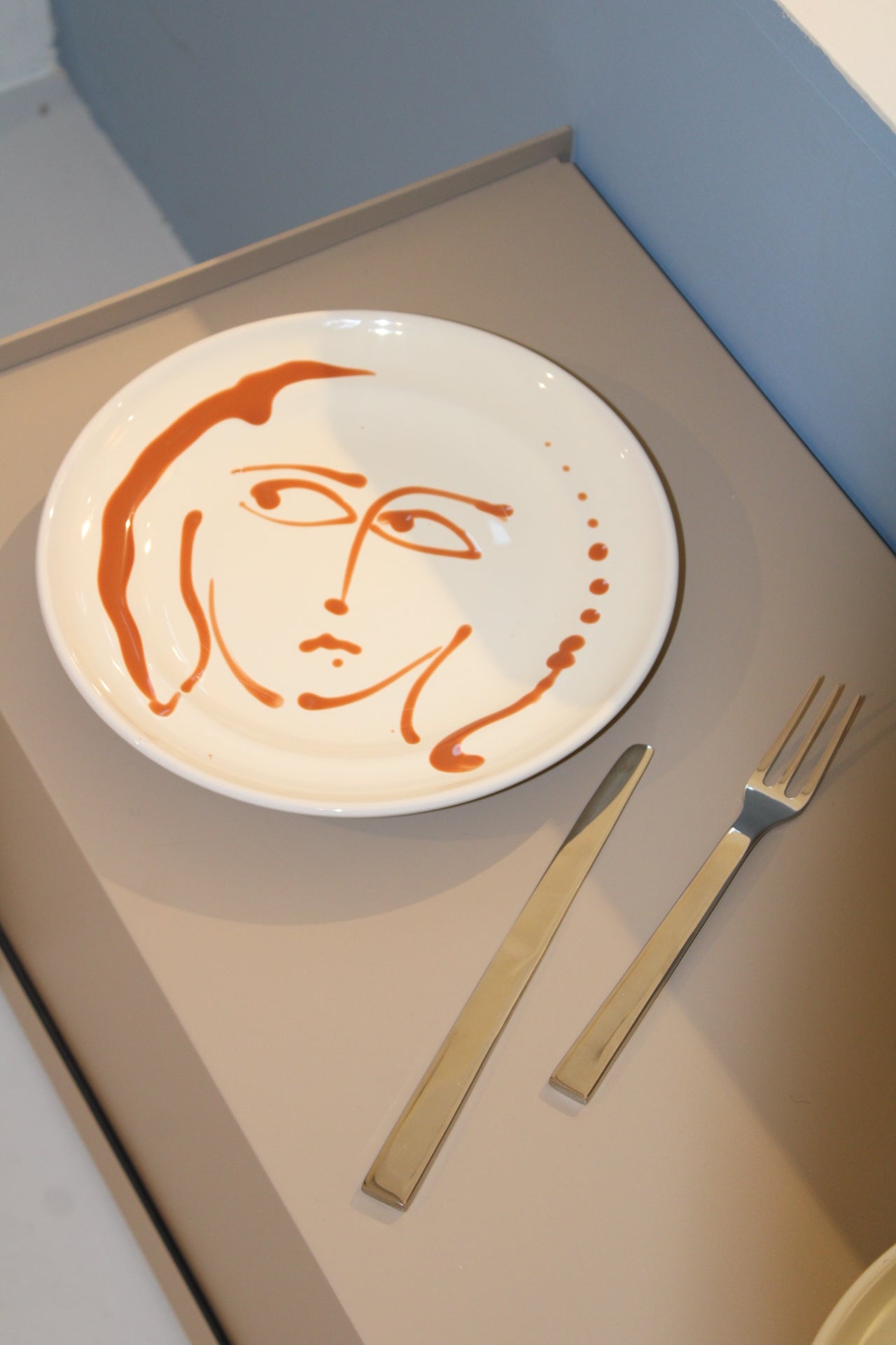 Fasano tallerken Face - Rust orange